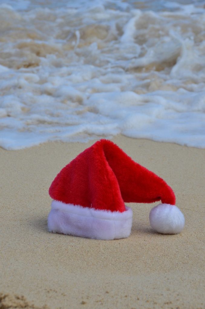 Christmas in Hawaii - Christmas dinner is followed by a trip to the beach — wearing Santa hats and leis, of course